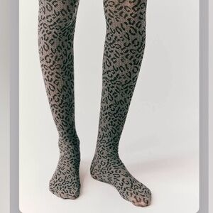 Free people animal instinct tights snow leopard